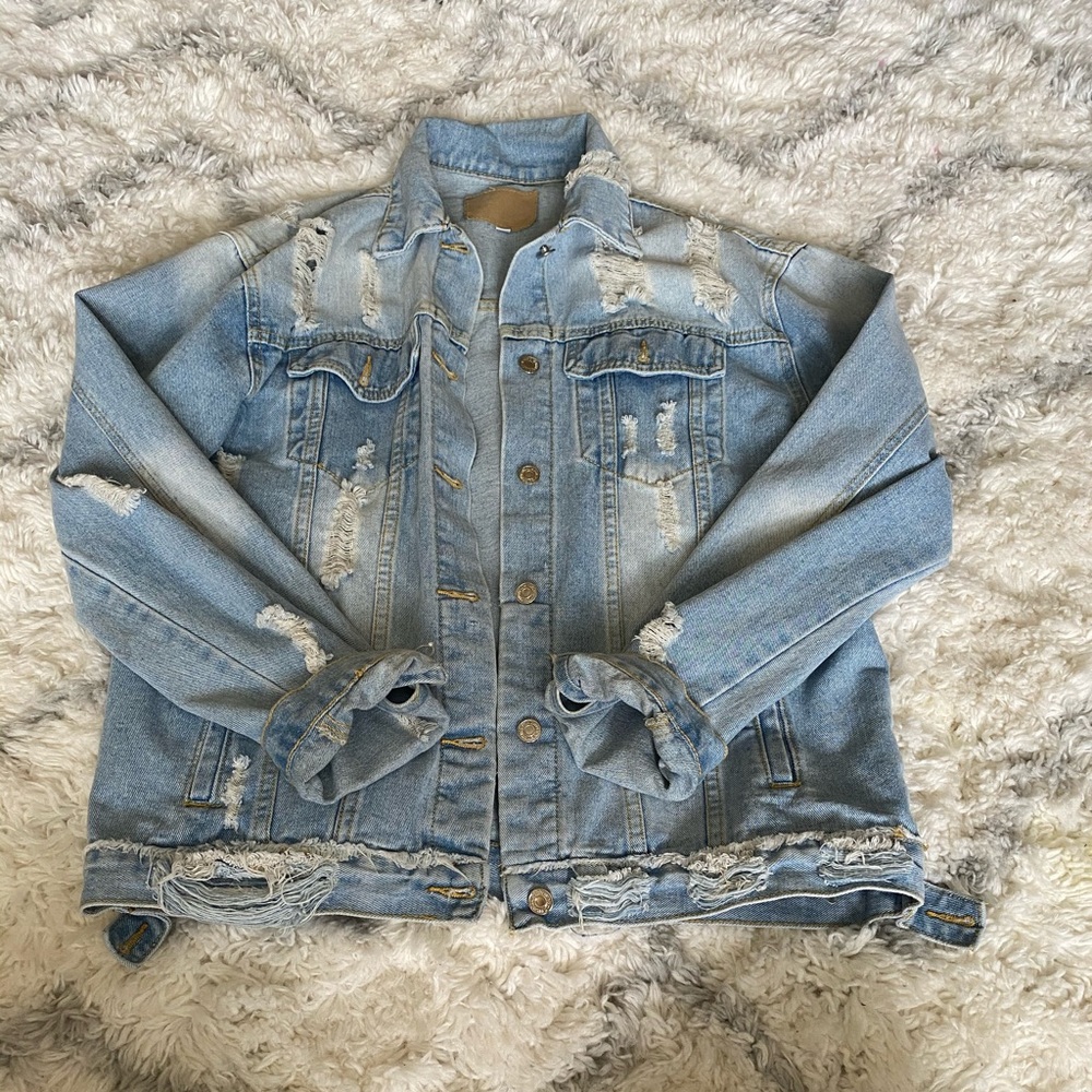 Distressed jean jacket